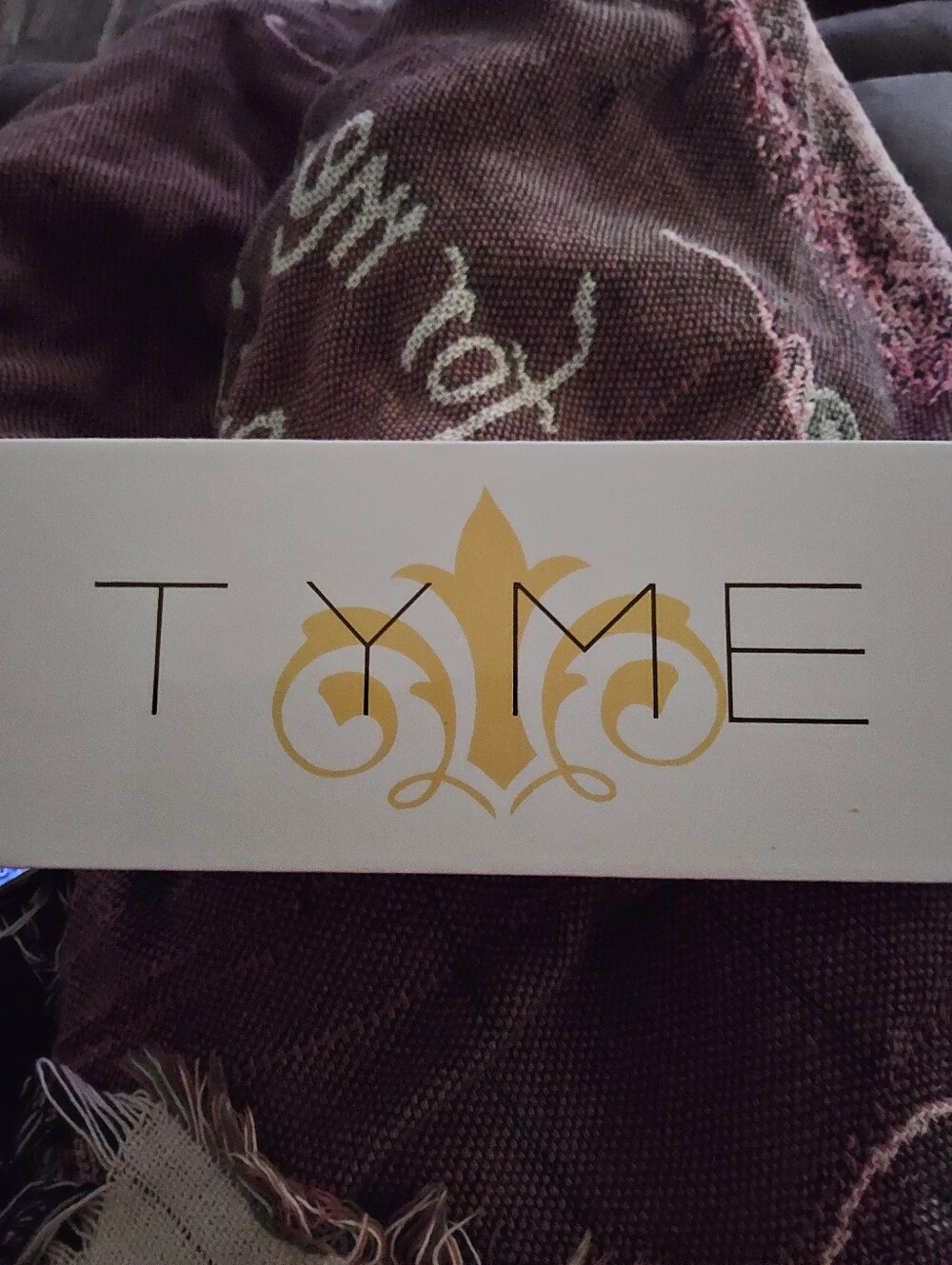 TYME Gold and Black Styling Iron with Olive Pouch